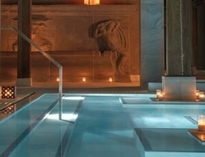 Modern bathhouse interior with thermal pools and sauna spaces